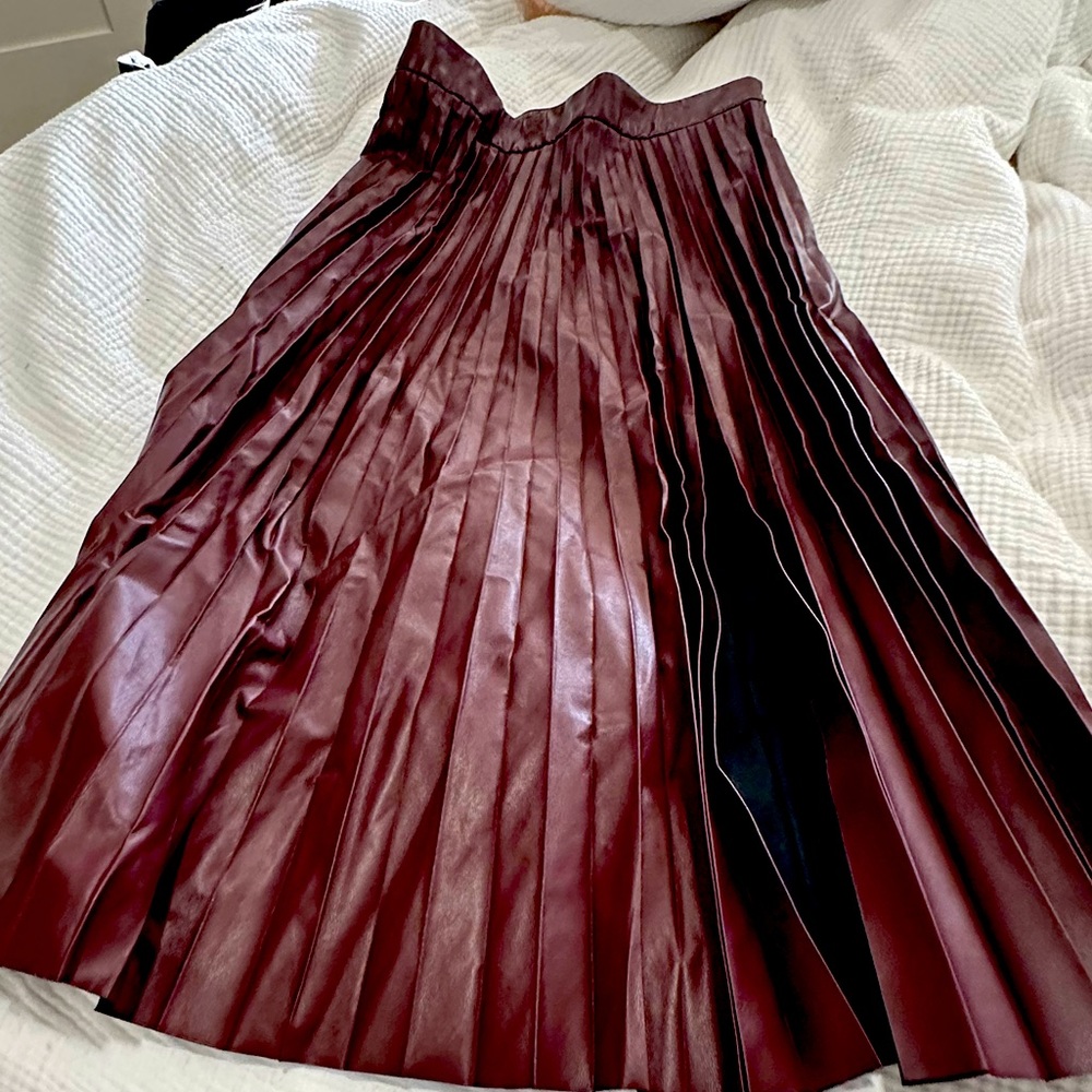 Never been worn red dark vegan leather skirt